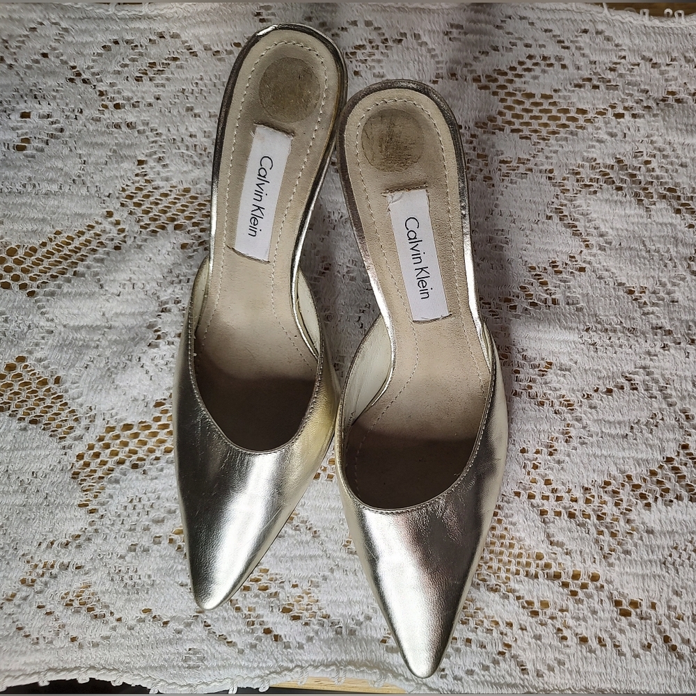 Size 6 Calvin Klein Landry silver pointed toe open back heels